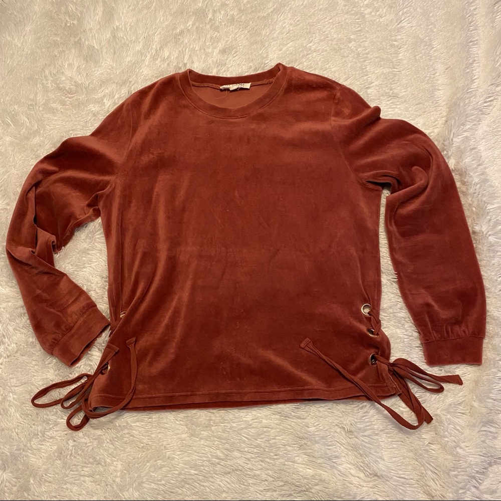 Velvety Soft and Unique side tie tie up blouse.